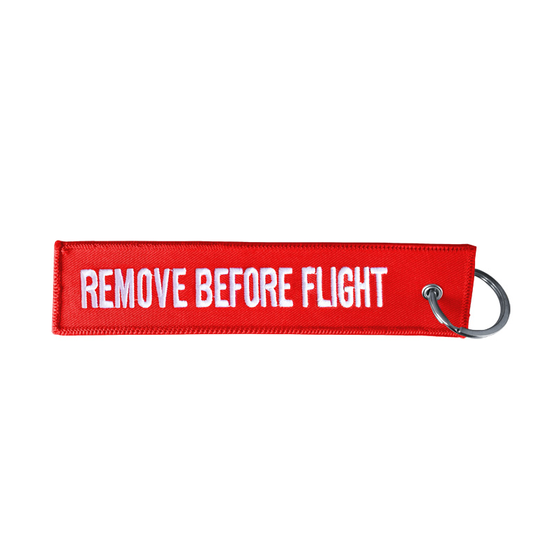 Simoni Racing Sleutelhanger Remove Before Flight - Rood
